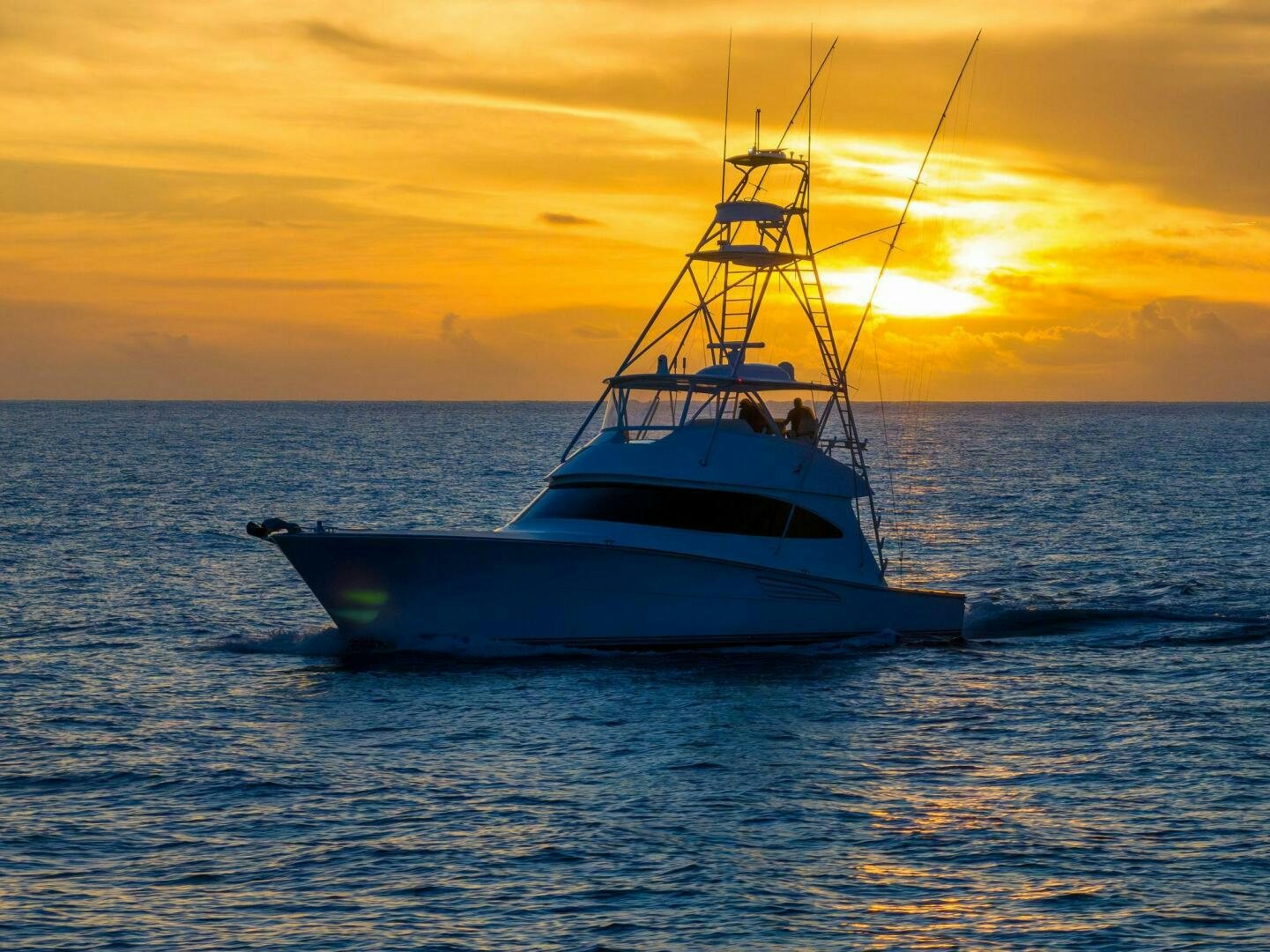 a boat in the water aboard PLAN B Yacht for Sale