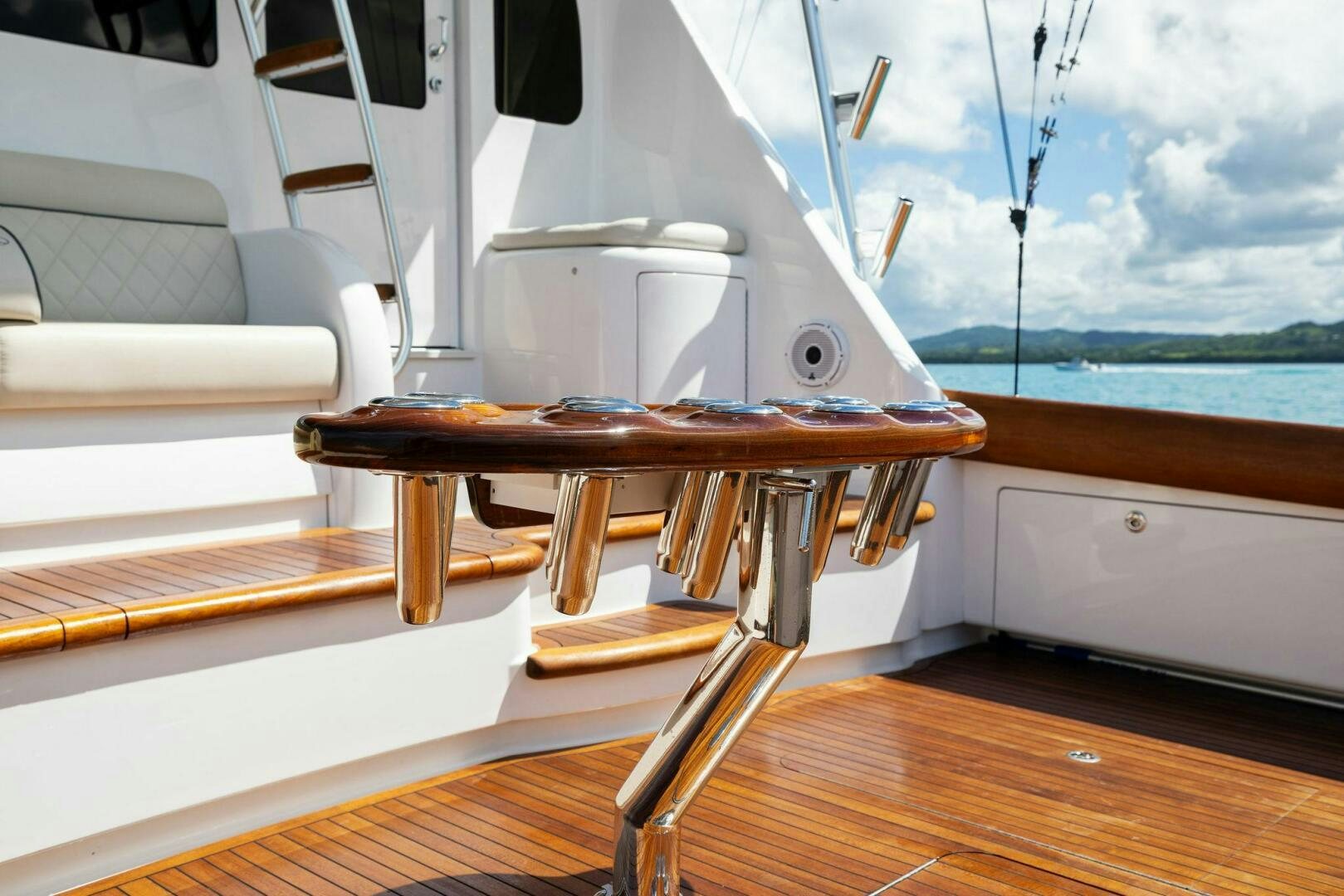 a wooden boat on a deck aboard PLAN B Yacht for Sale