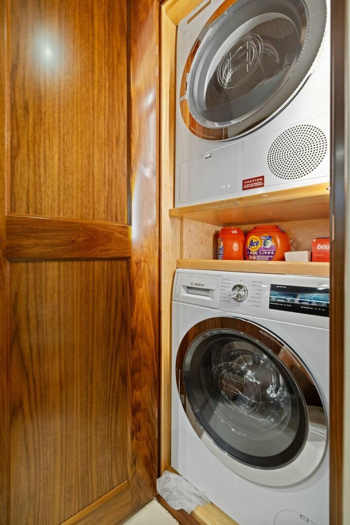 a white washing machine aboard PLAN B Yacht for Sale