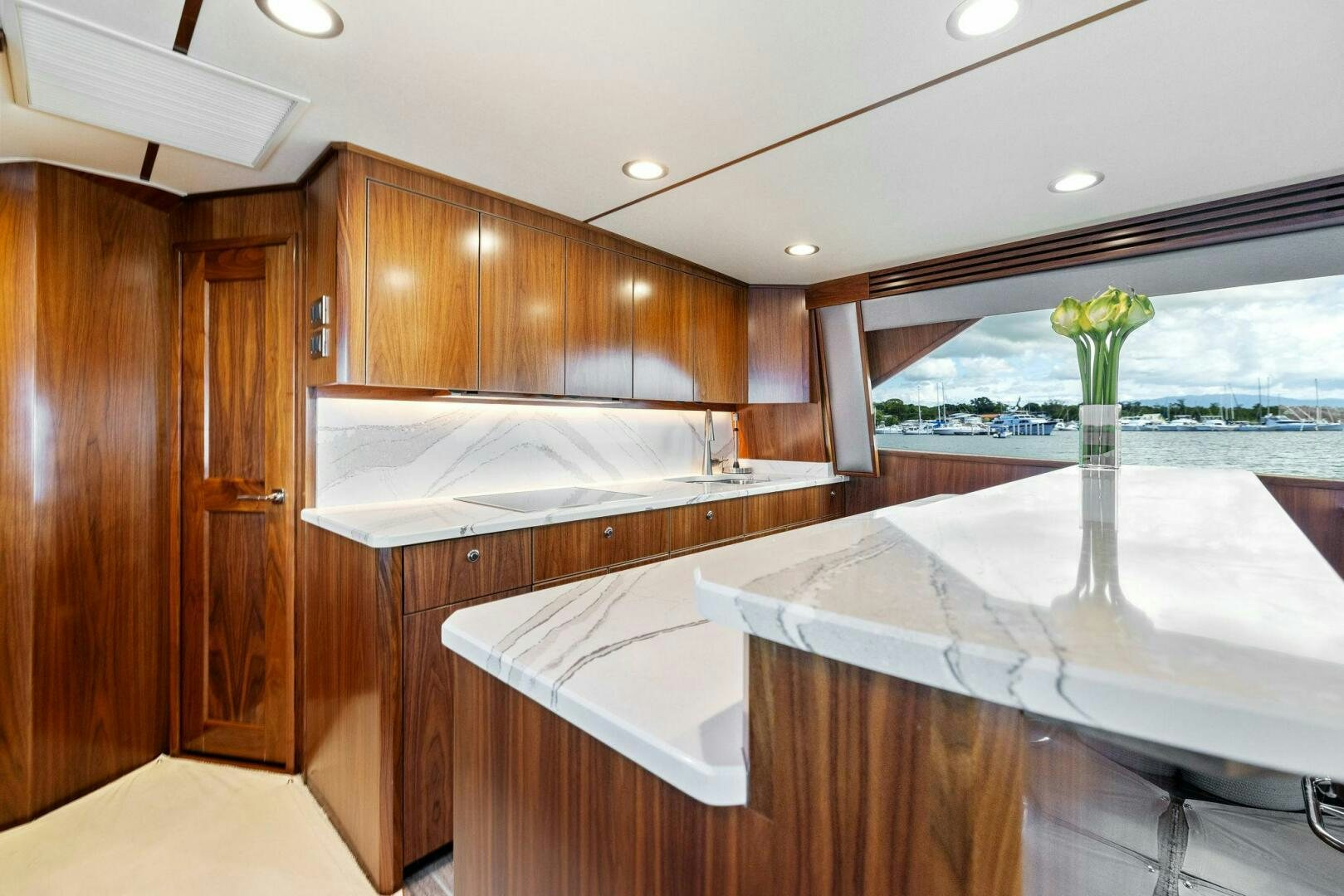 a modern bathroom with a large jacuzzi aboard PLAN B Yacht for Sale