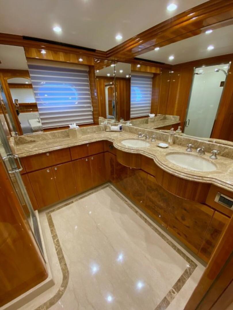 a bathroom with a large tub aboard BRANDI WINE Yacht for Sale