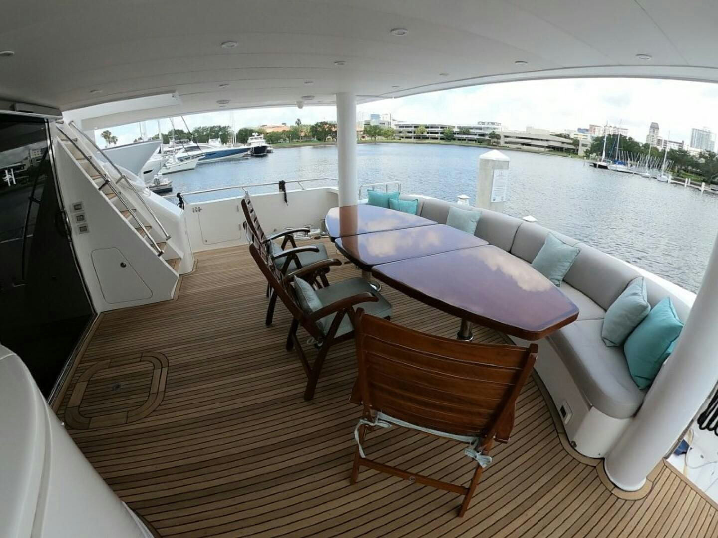 a living room with a couch and a table aboard BRANDI WINE Yacht for Sale