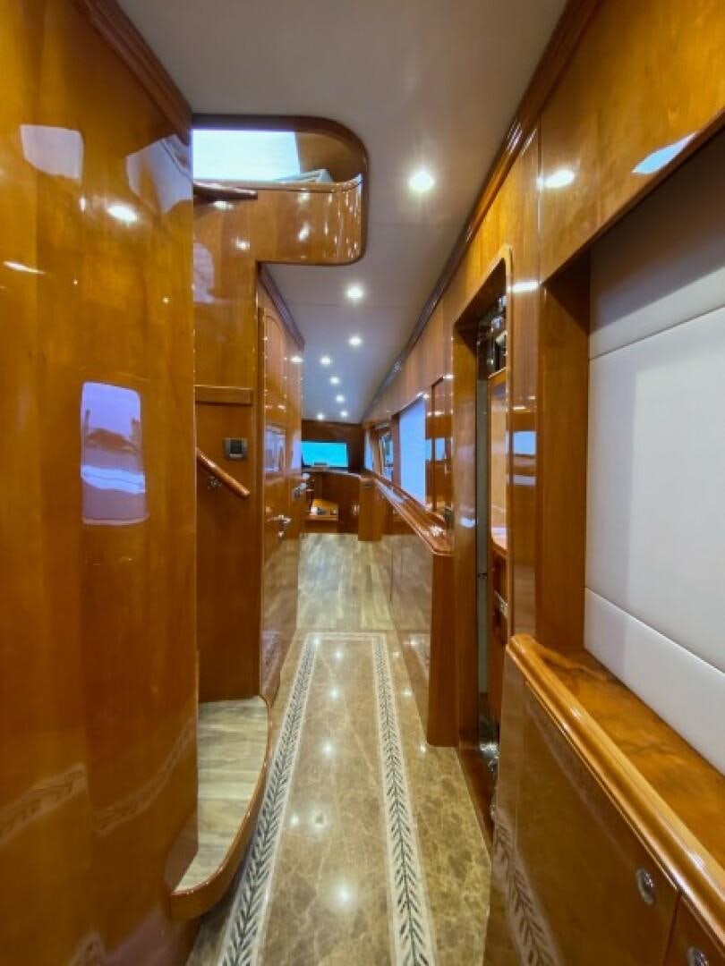 a hallway with a glass door aboard BRANDI WINE Yacht for Sale