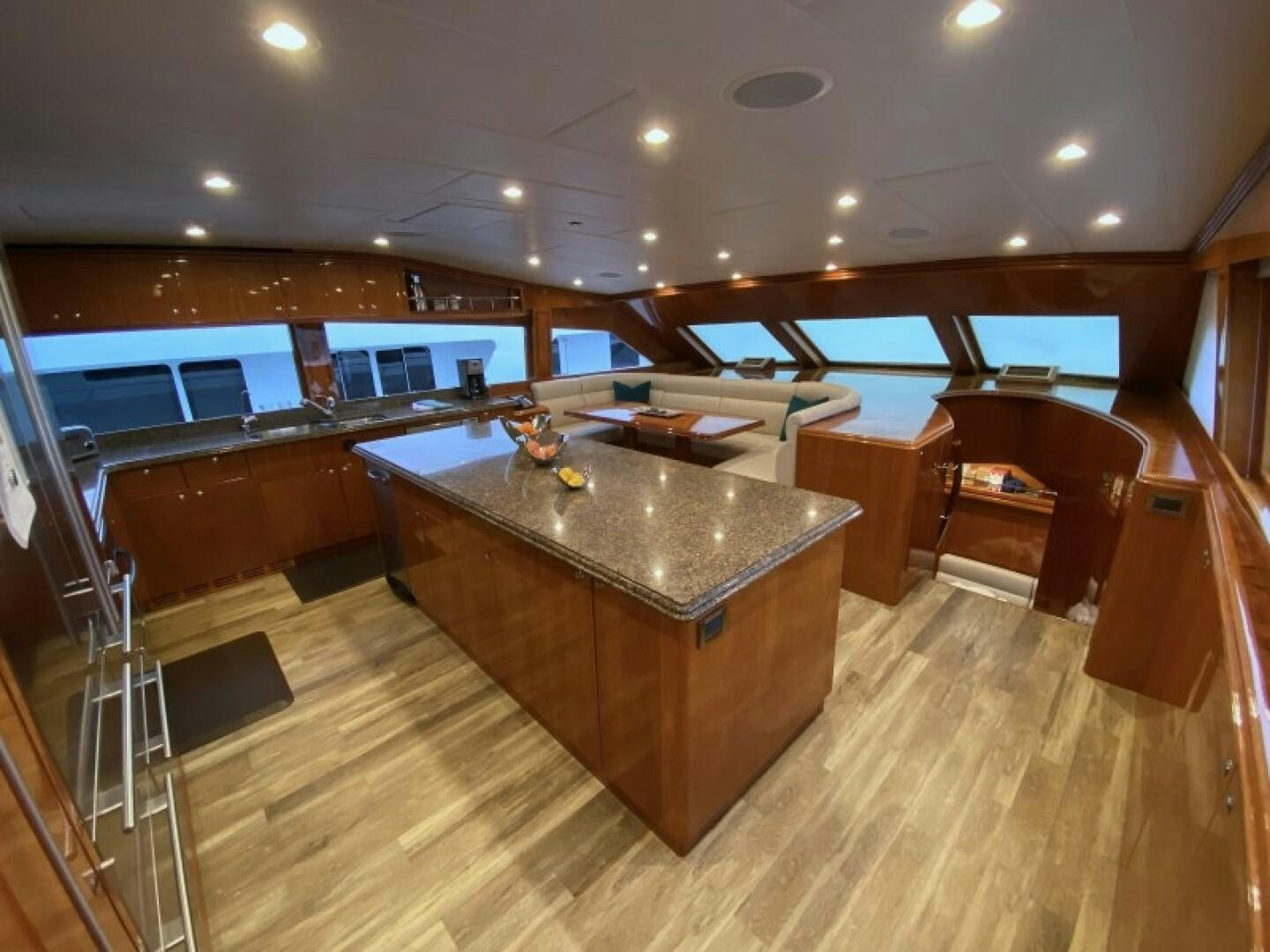 a large room with a bar and a pool table aboard BRANDI WINE Yacht for Sale