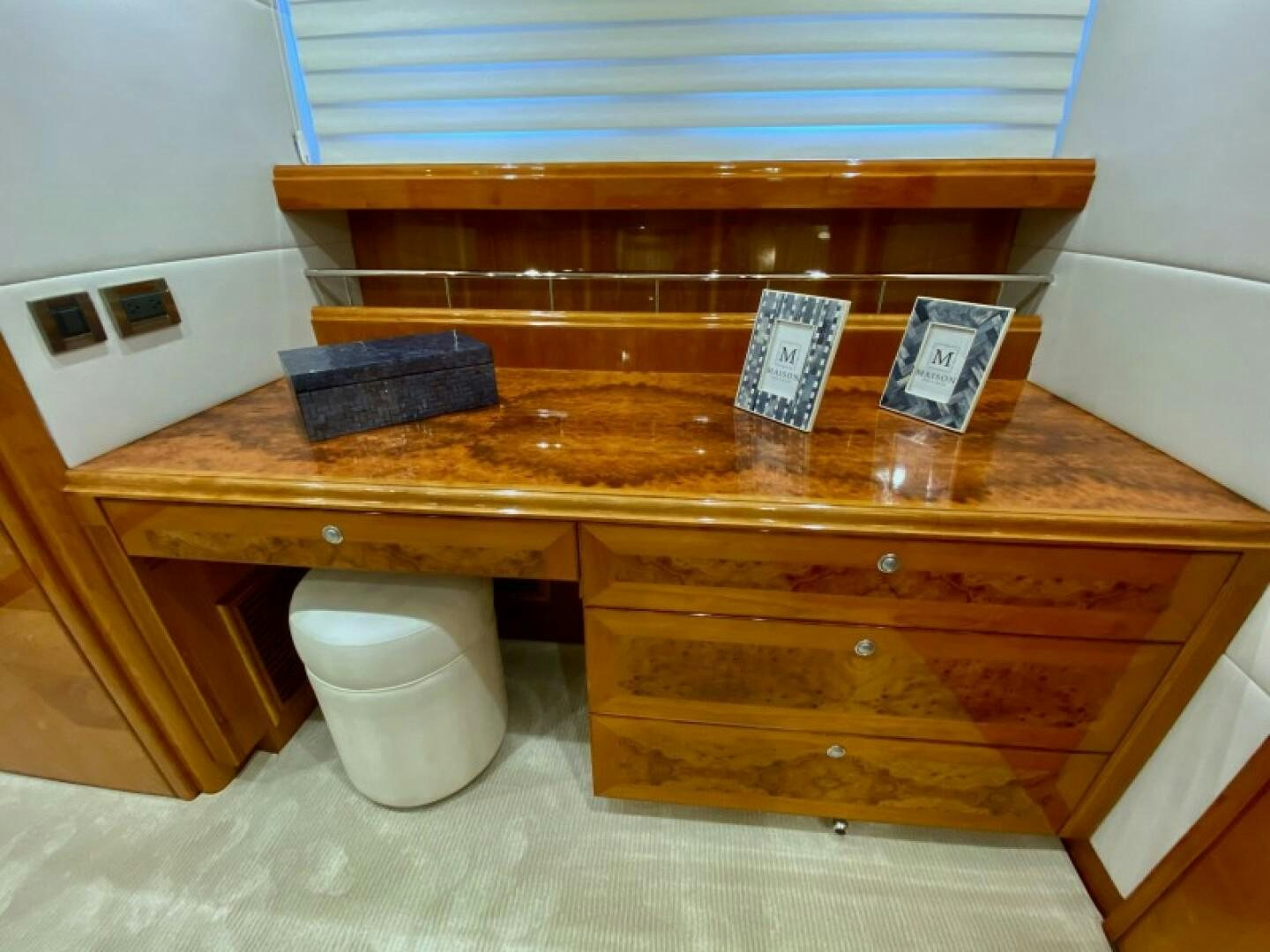 a wooden desk with a white bucket aboard BRANDI WINE Yacht for Sale