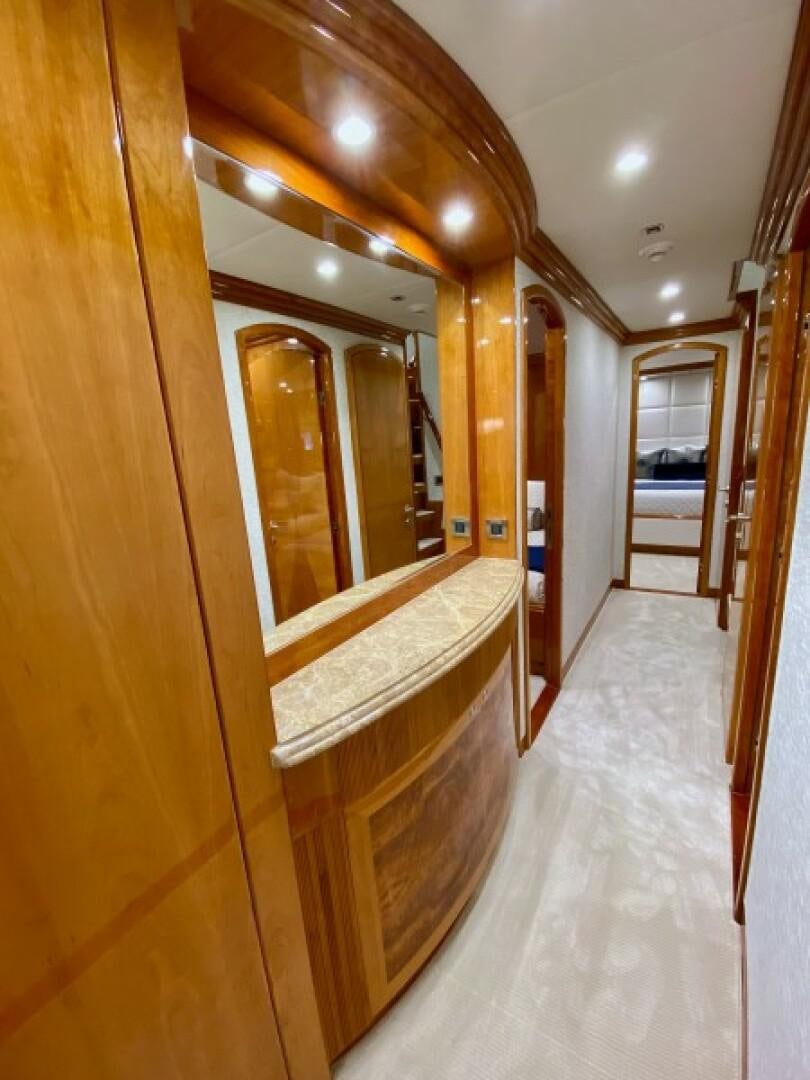 a hallway with a mirror aboard BRANDI WINE Yacht for Sale
