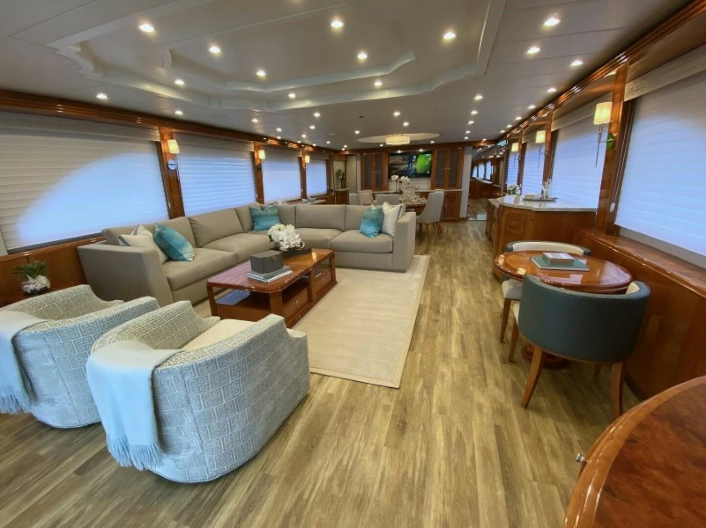 a living room with a large window aboard BRANDI WINE Yacht for Sale