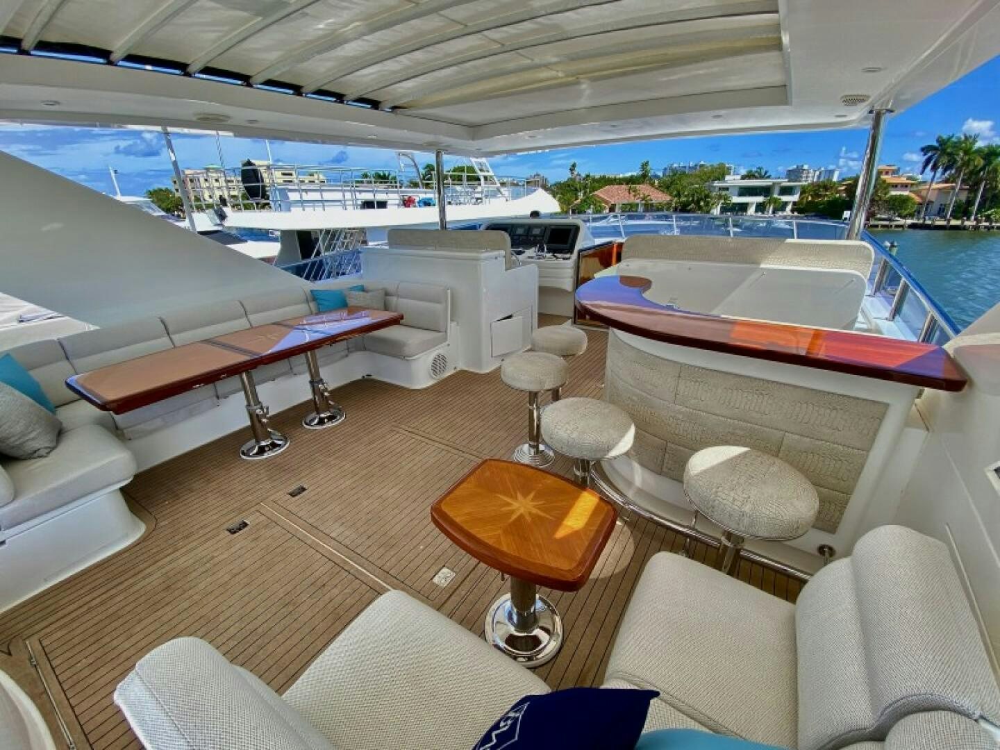 a boat with a deck and chairs aboard BRANDI WINE Yacht for Sale