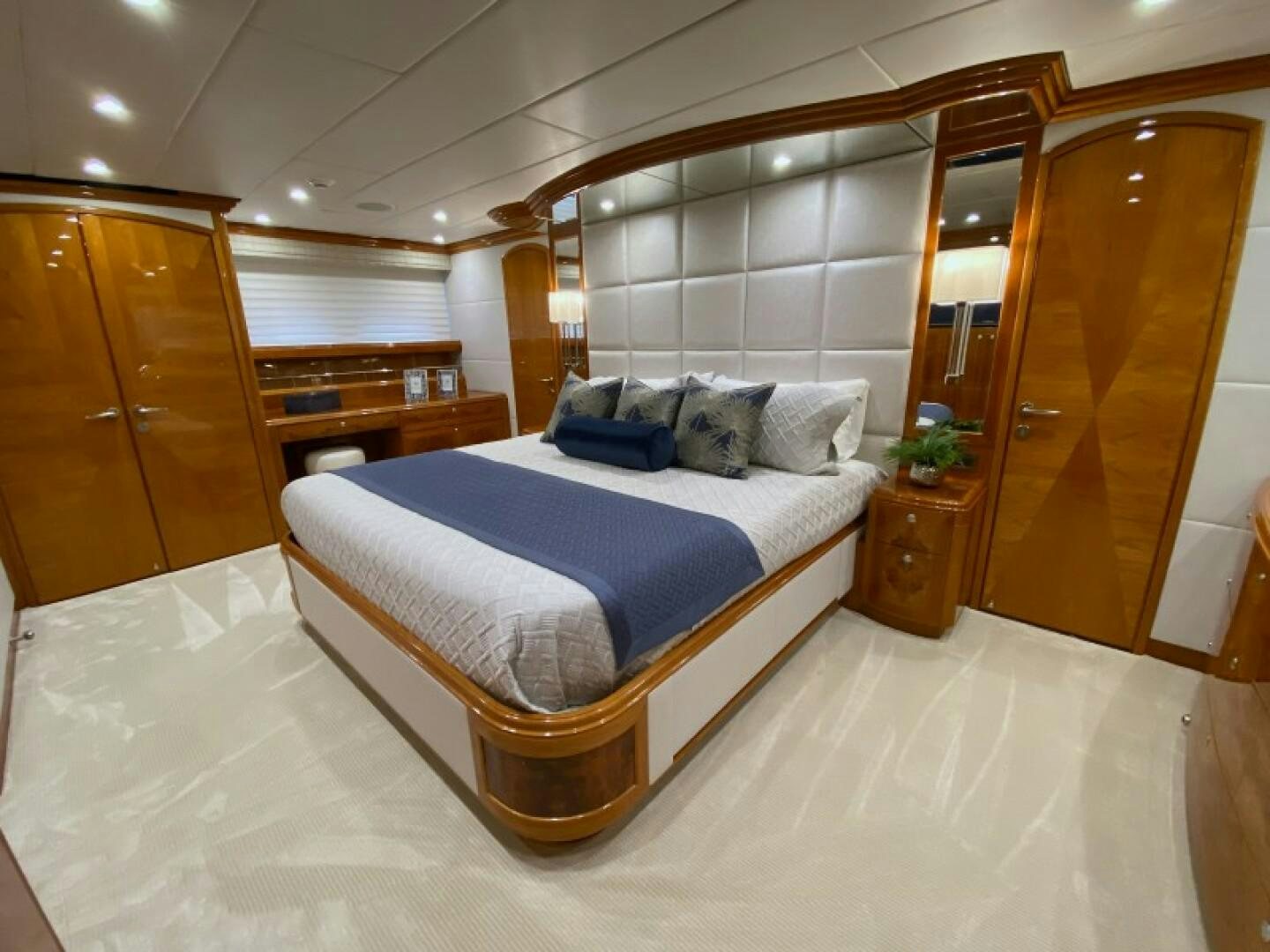a large bedroom with a large bed aboard BRANDI WINE Yacht for Sale