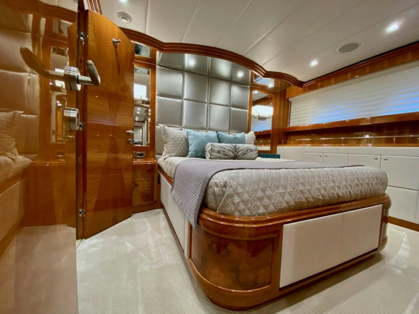 a bed in a room aboard BRANDI WINE Yacht for Sale