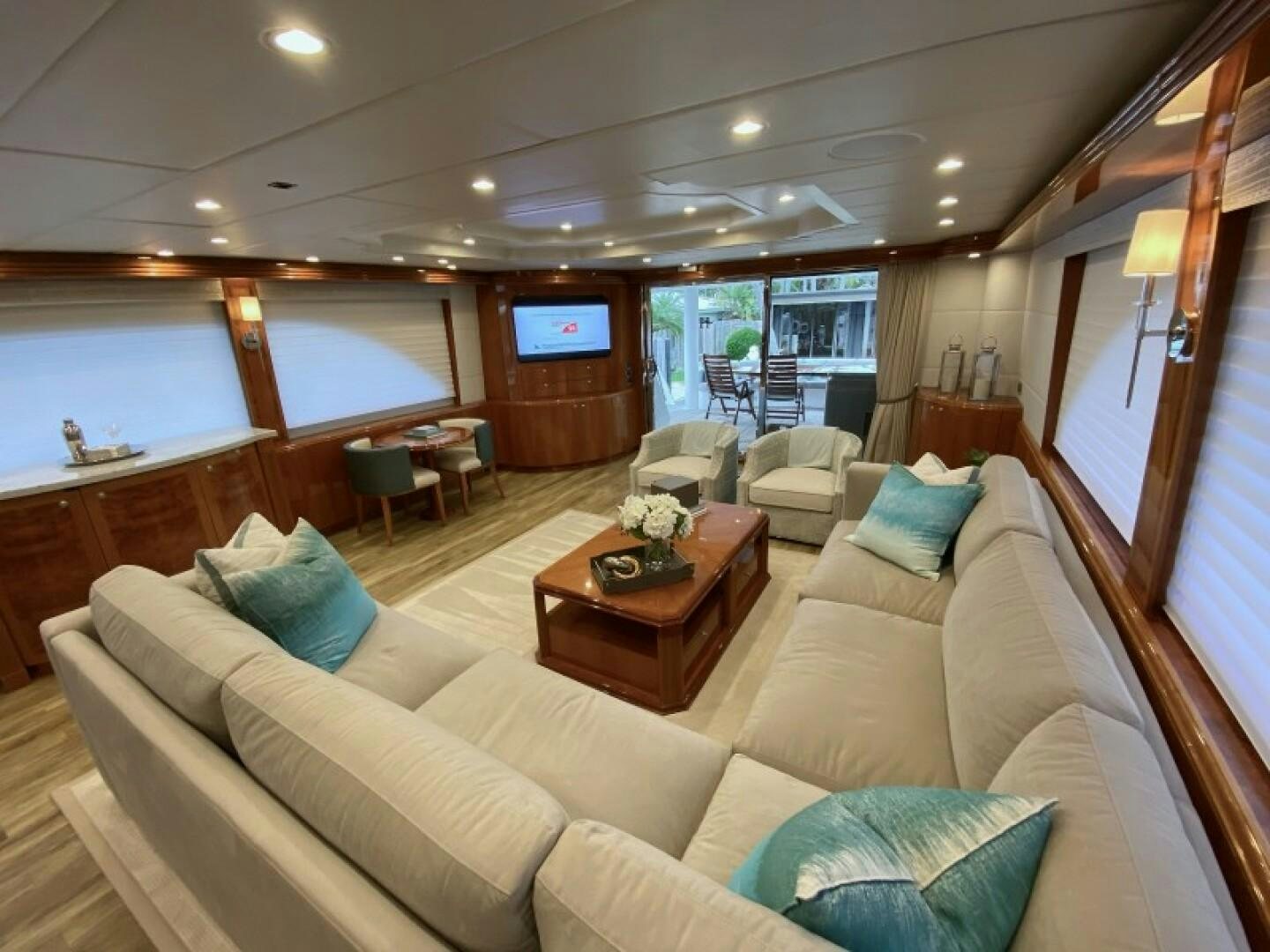 a living room with a large window aboard BRANDI WINE Yacht for Sale