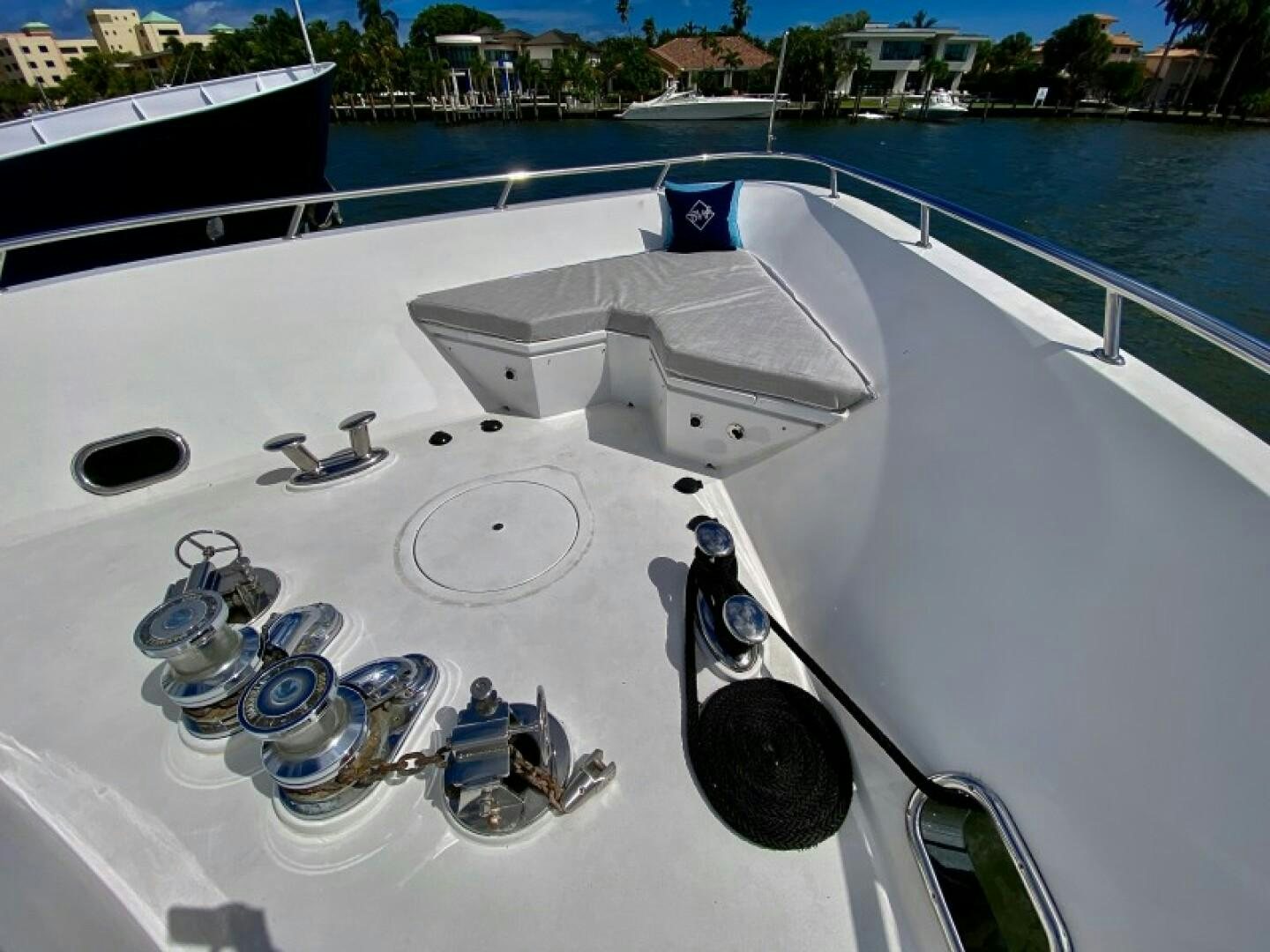 a white boat with a white surface and a black object on it aboard BRANDI WINE Yacht for Sale