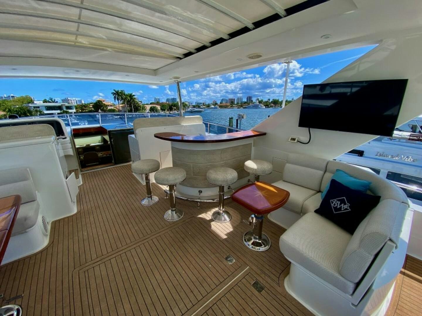 a room with a table and chairs aboard BRANDI WINE Yacht for Sale
