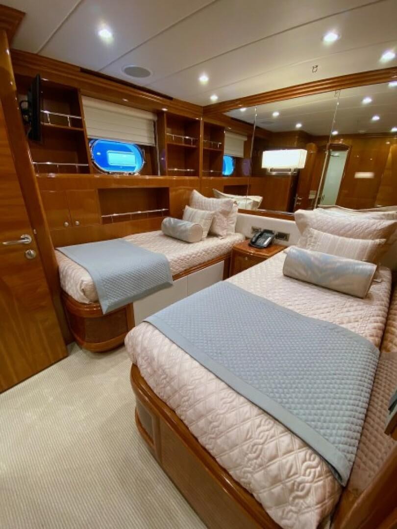 a room with two beds aboard BRANDI WINE Yacht for Sale