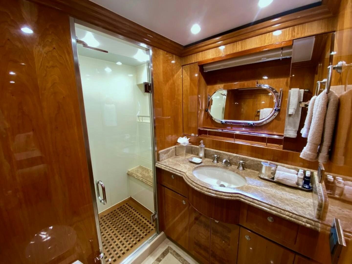 a bathroom with a large mirror aboard BRANDI WINE Yacht for Sale