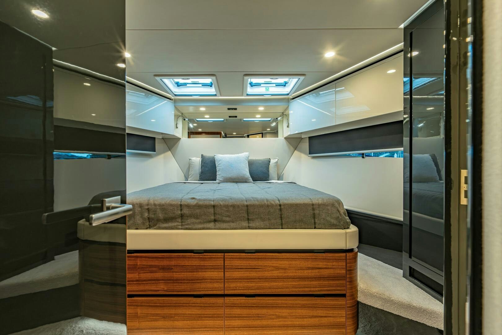 a room with a bed and a couch aboard BIG MAMA Yacht for Sale
