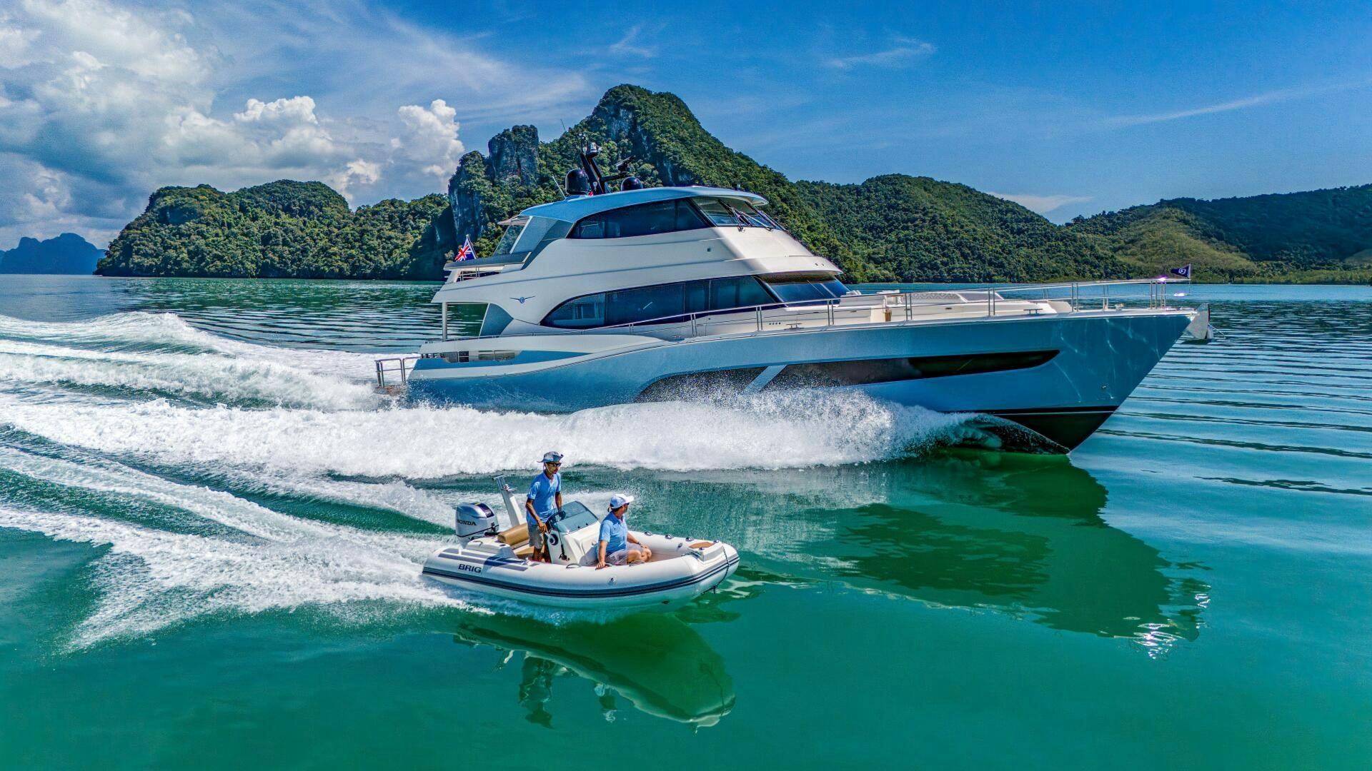 a boat with a motor boat aboard BIG MAMA Yacht for Sale