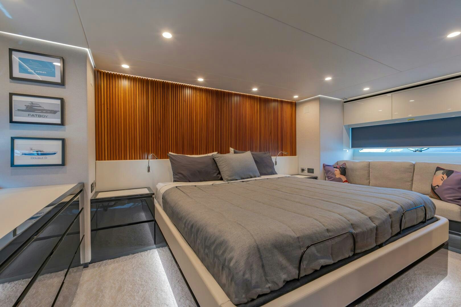a room with a bed and a couch aboard BIG MAMA Yacht for Sale