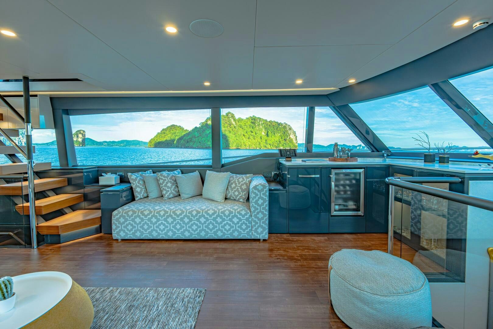 a living room with a large glass window aboard BIG MAMA Yacht for Sale