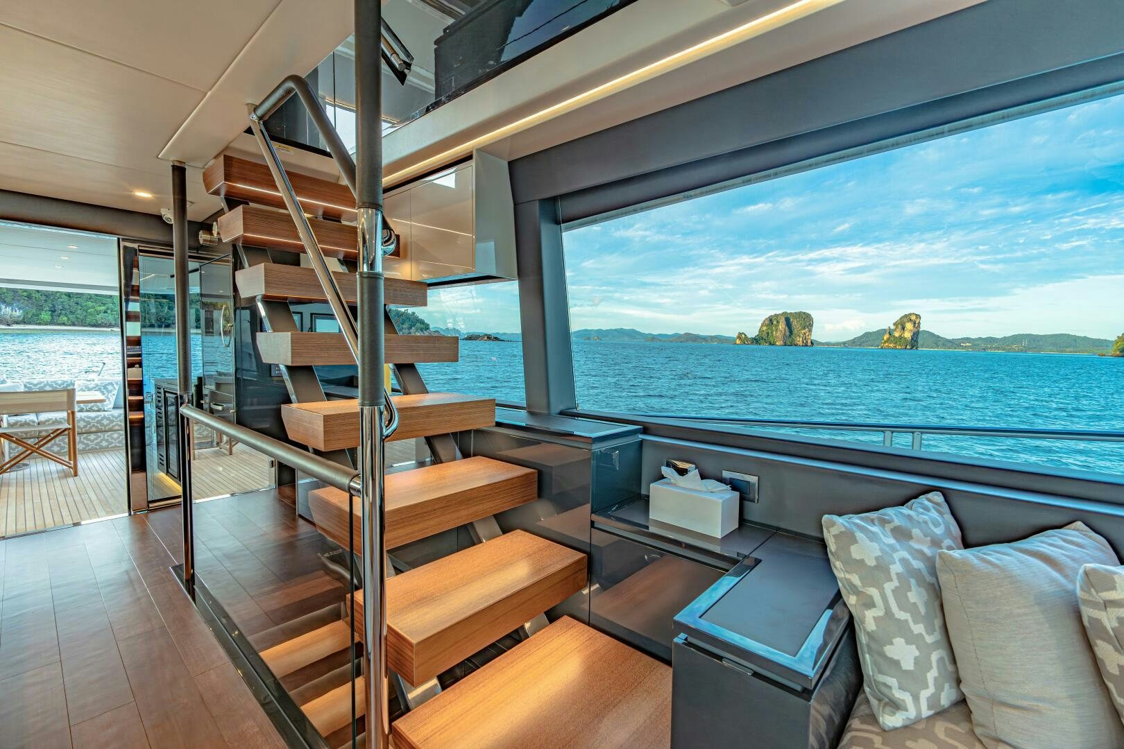 a room with a bed and a large window aboard BIG MAMA Yacht for Sale