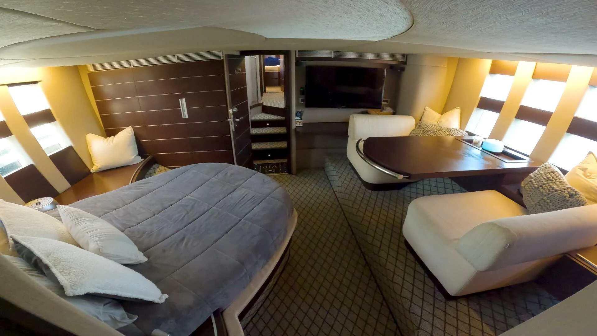 a room with a couch and a table aboard BOAT Yacht for Sale