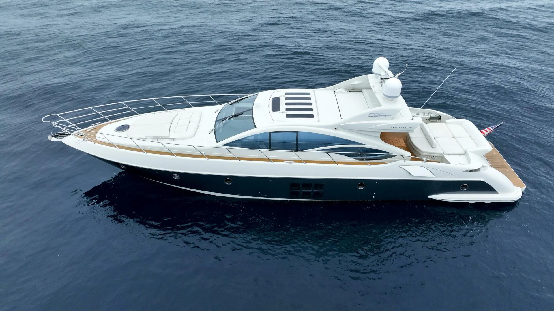 a white yacht in the water aboard BOAT Yacht for Sale