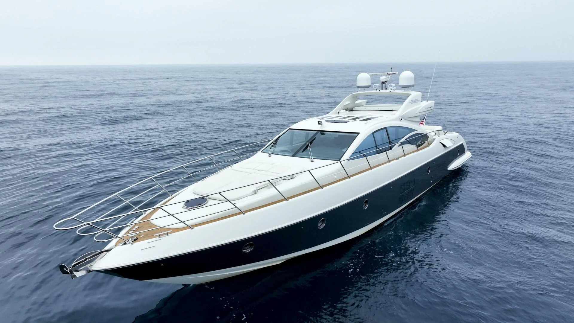 a white yacht in the water aboard BOAT Yacht for Sale