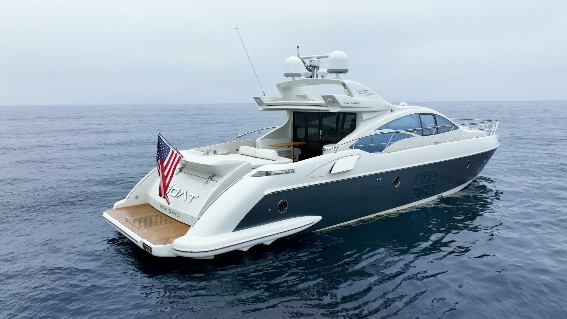 a white yacht on the water aboard BOAT Yacht for Sale