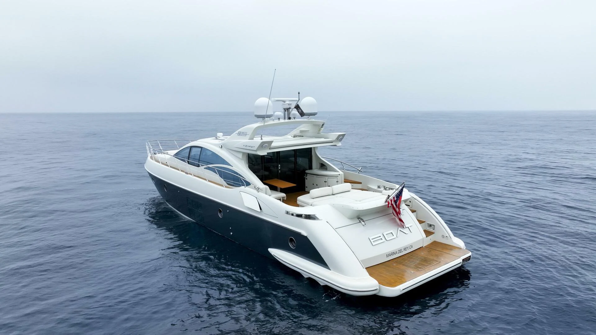 a white yacht in the water aboard BOAT Yacht for Sale