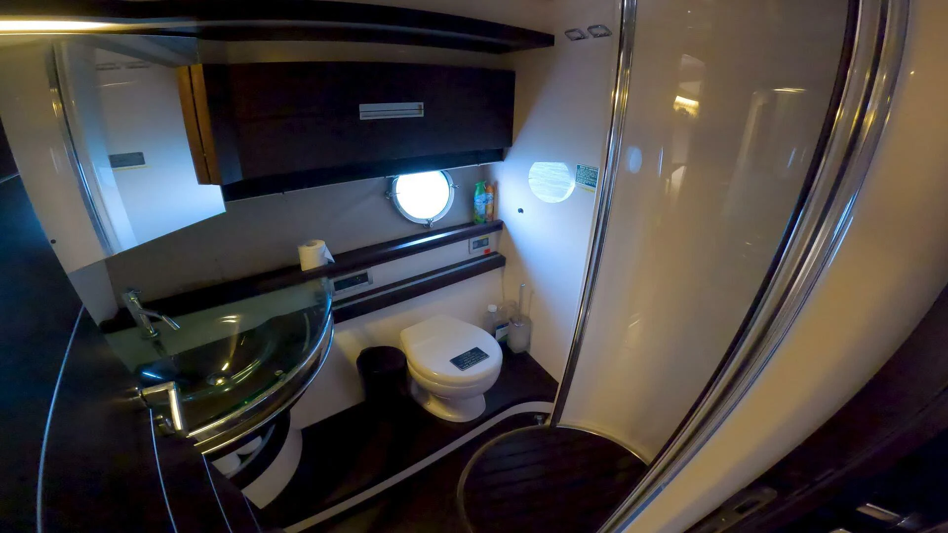 a bathroom with a large mirror aboard BOAT Yacht for Sale