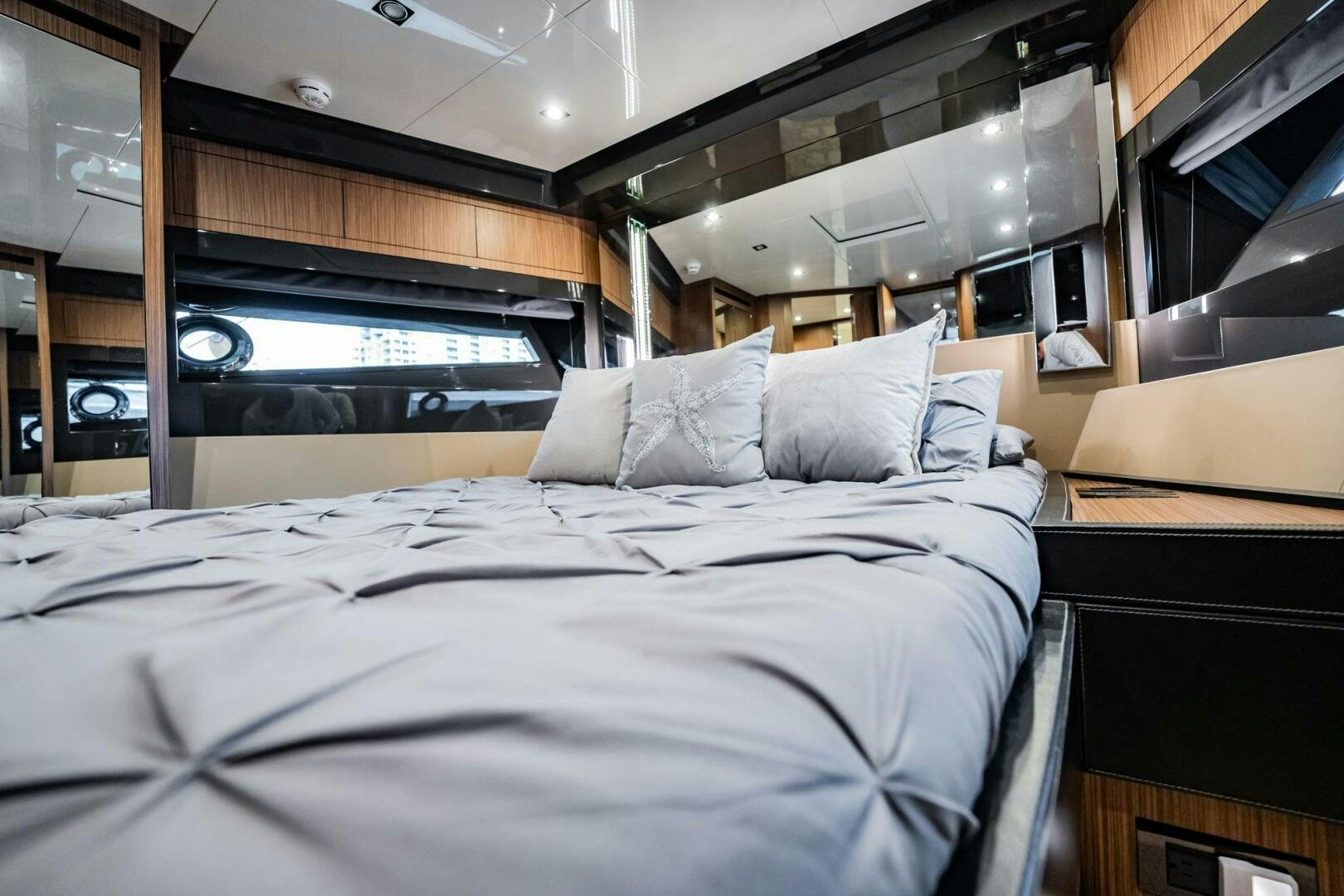 a bed with white sheets aboard RECREATIONAL USE Yacht for Sale