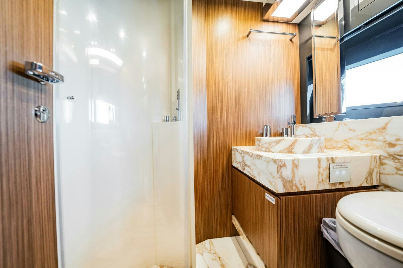 a bathroom with a sink and toilet aboard RECREATIONAL USE Yacht for Sale