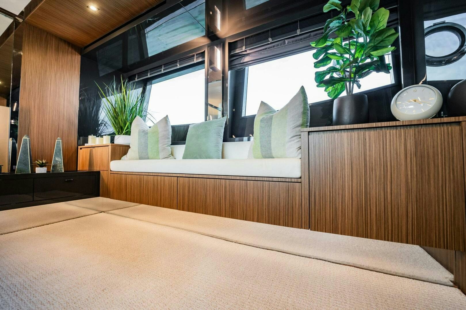a room with a bed and a plant in it aboard RECREATIONAL USE Yacht for Sale