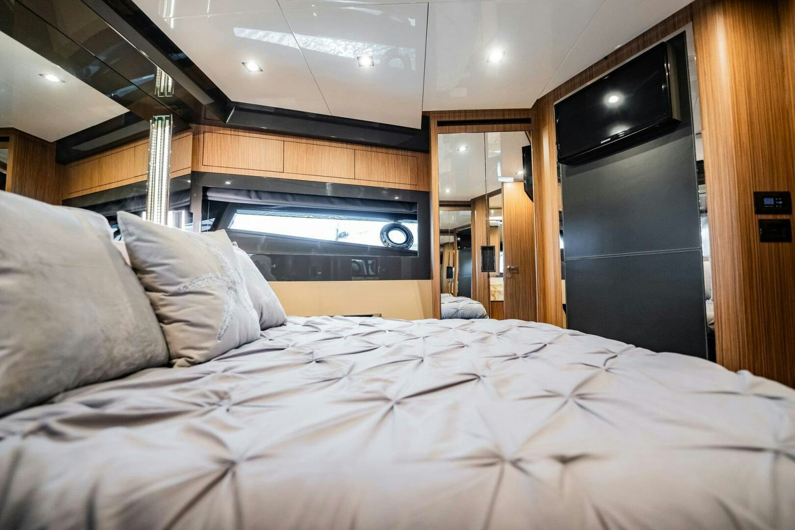 a bed with a white sheet aboard RECREATIONAL USE Yacht for Sale