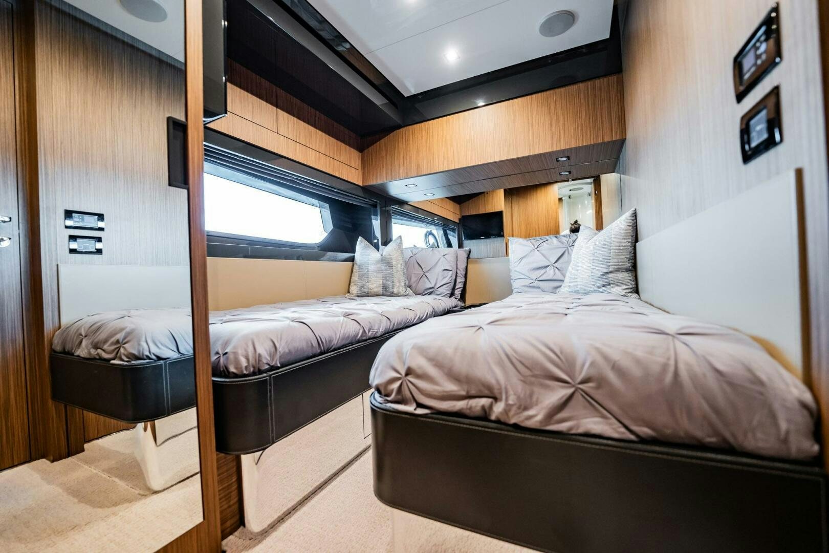 a room with two beds aboard RECREATIONAL USE Yacht for Sale