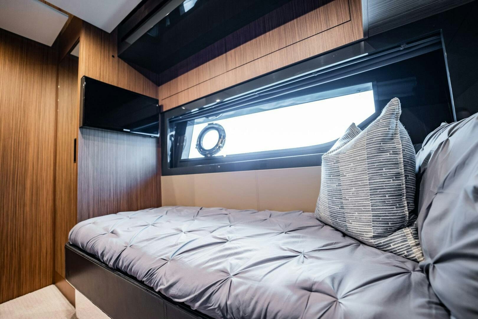a bed with white sheets aboard RECREATIONAL USE Yacht for Sale