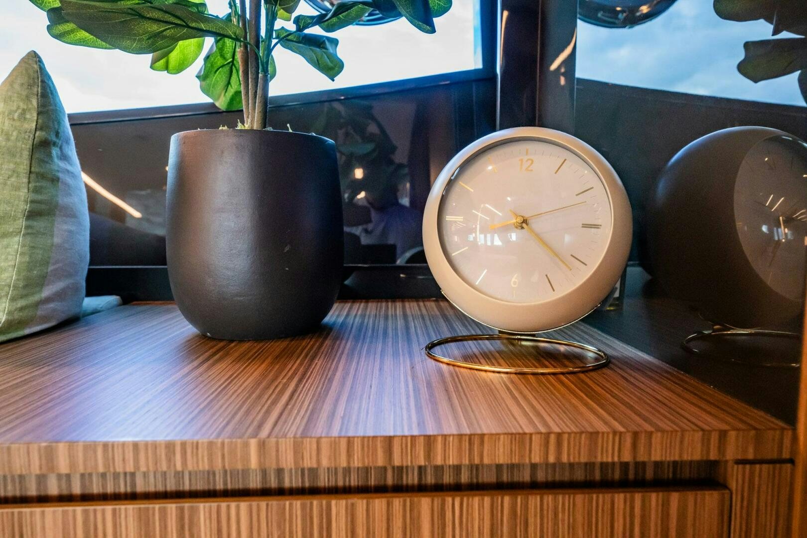 a clock on a table aboard RECREATIONAL USE Yacht for Sale