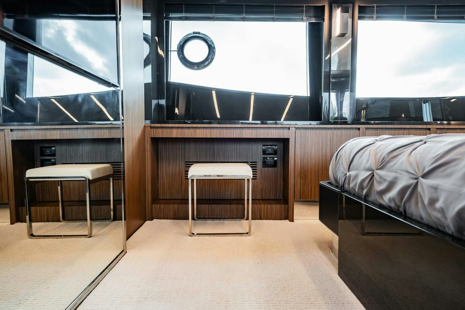 a room with a bed and desk aboard RECREATIONAL USE Yacht for Sale
