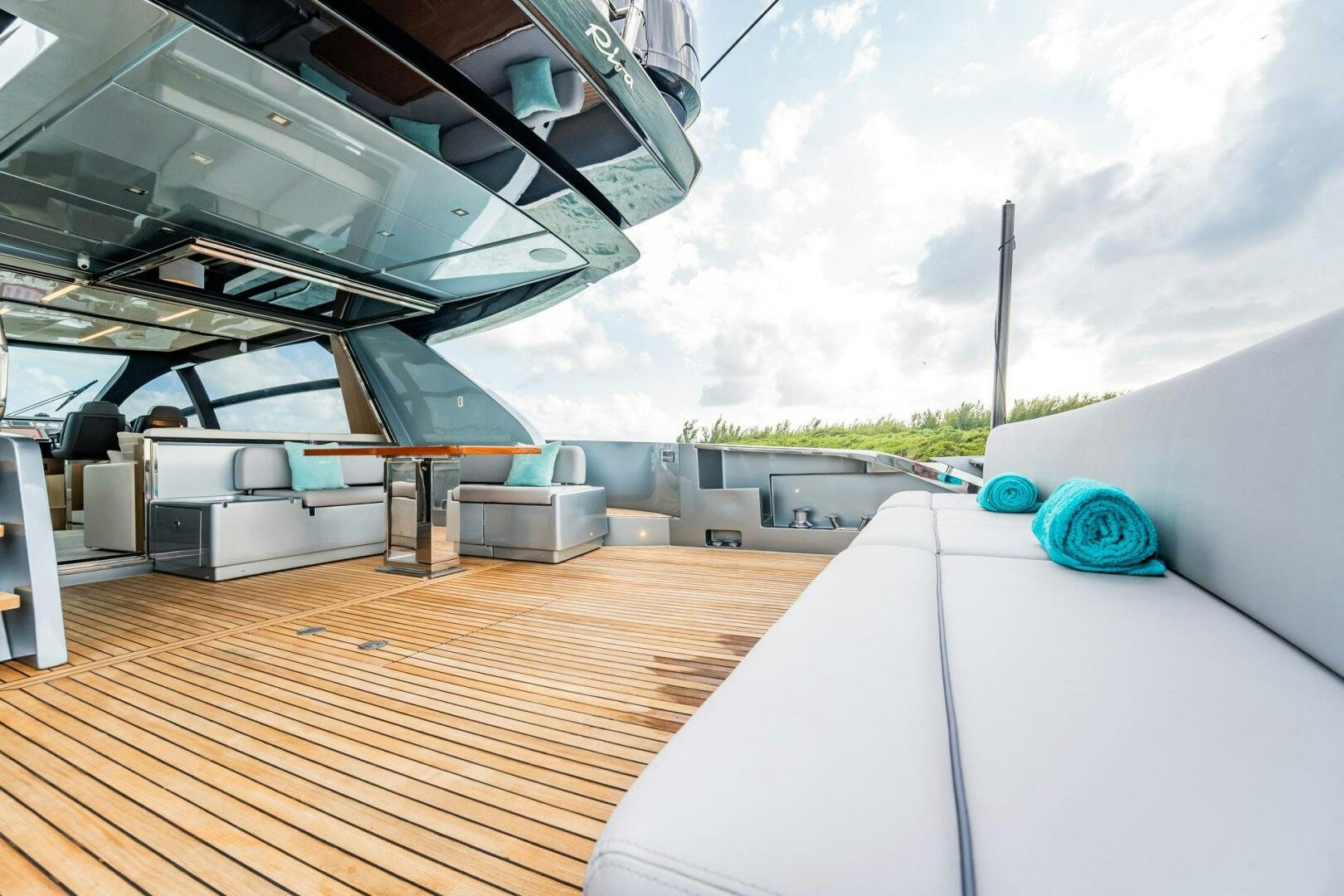 a deck with a deck and a boat on it aboard RECREATIONAL USE Yacht for Sale
