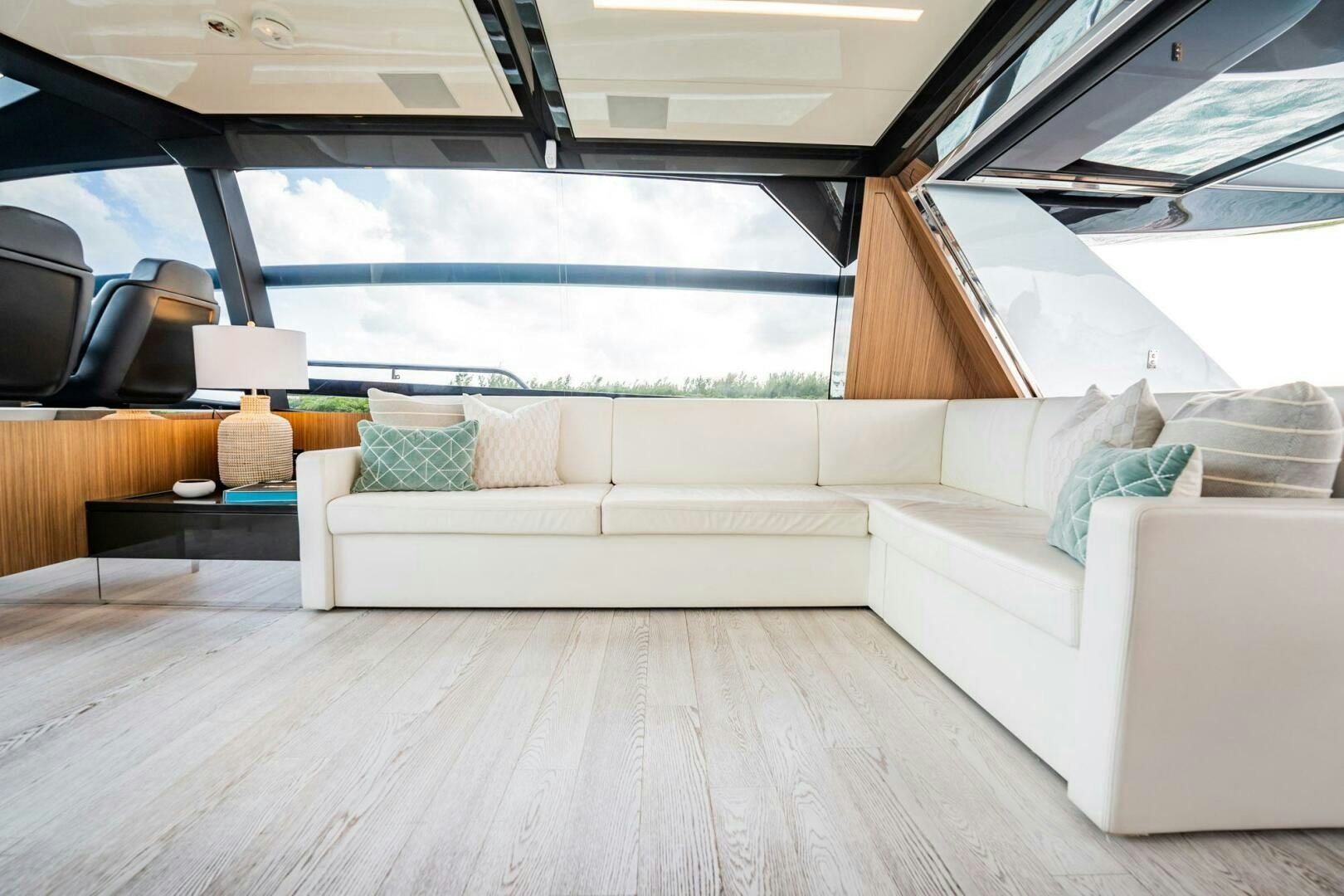 a living room with a large window aboard RECREATIONAL USE Yacht for Sale