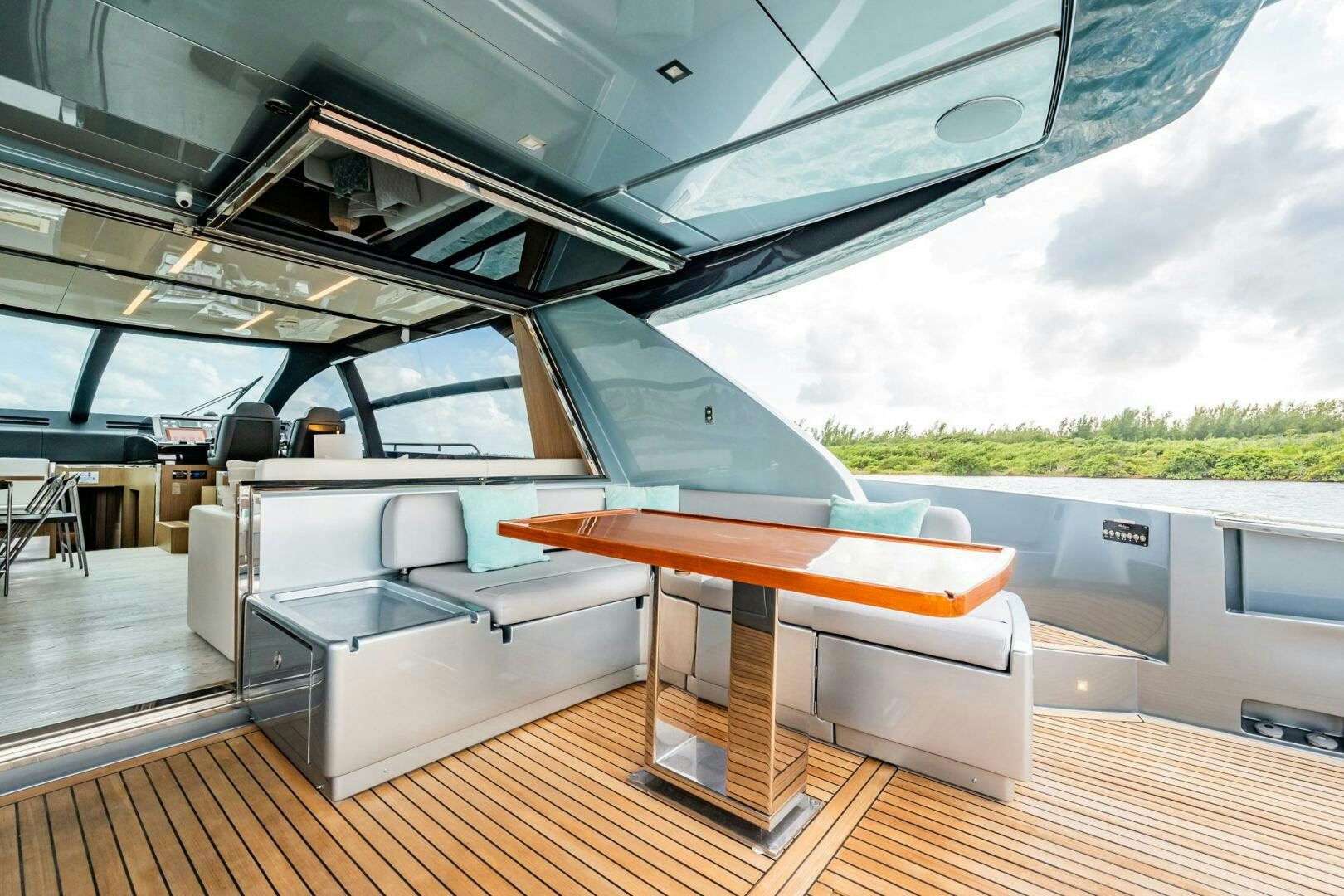a large room with a table and chairs aboard RECREATIONAL USE Yacht for Sale