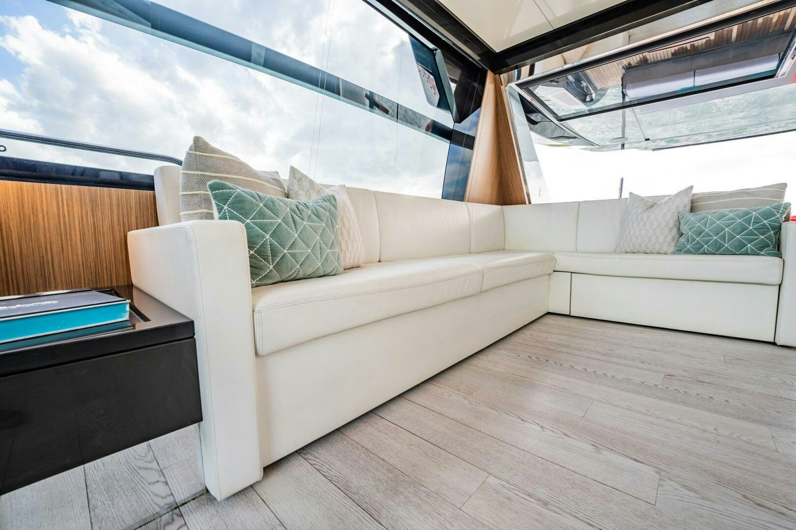 a couch in a room aboard RECREATIONAL USE Yacht for Sale