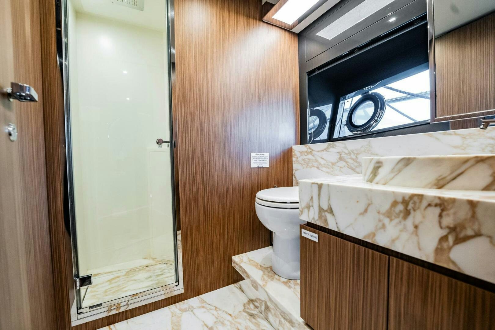 a bathroom with a tub and toilet aboard RECREATIONAL USE Yacht for Sale
