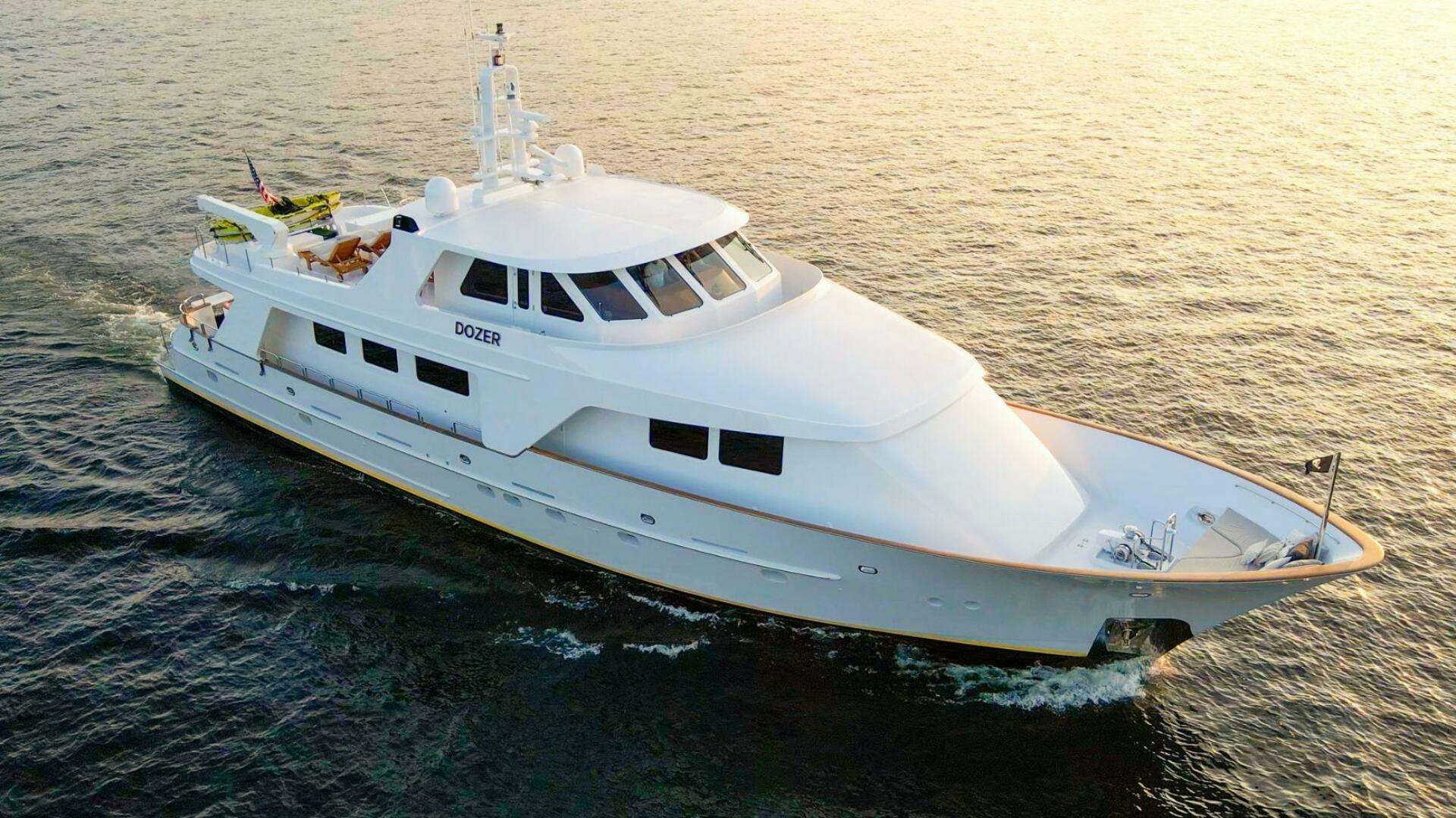 a white boat in the water aboard DOZER Yacht for Sale