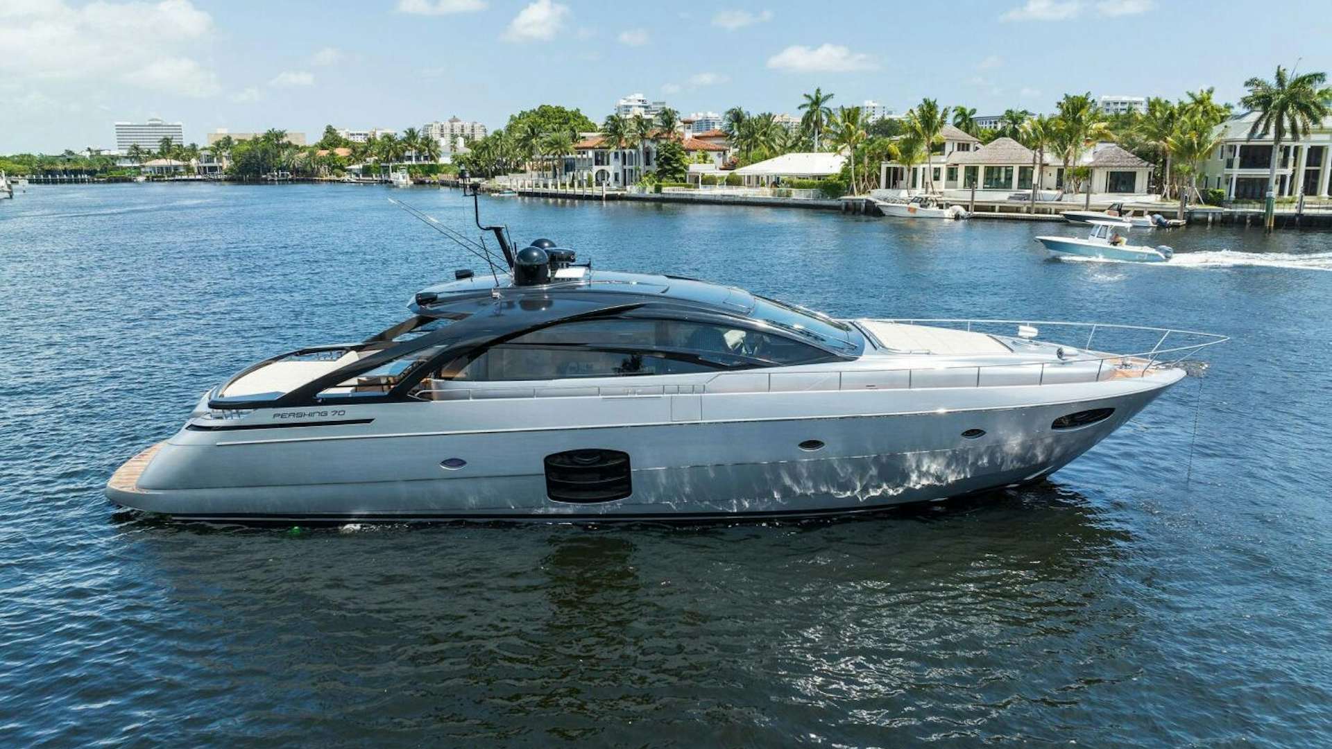 a white yacht in the water aboard LIQUID Yacht for Sale