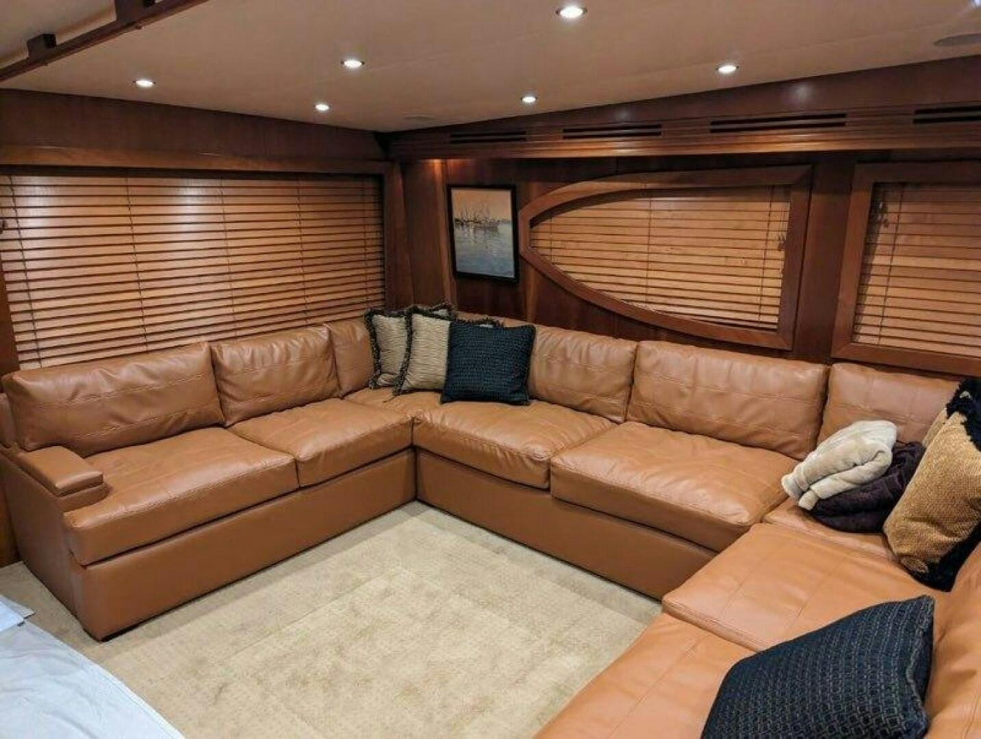 a living room with a couch aboard BUZZ Yacht for Sale