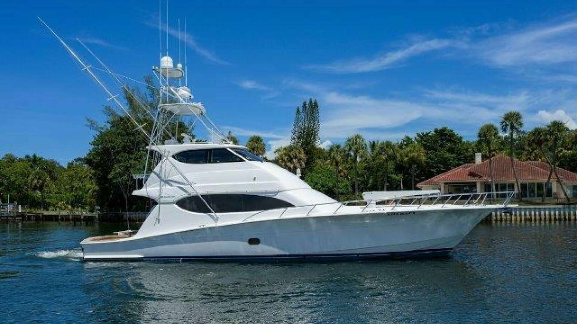 a white yacht on the water aboard BUZZ Yacht for Sale