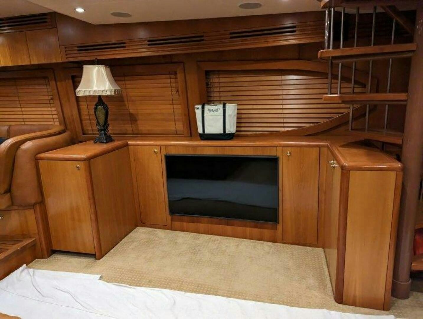 a room with a fireplace aboard BUZZ Yacht for Sale