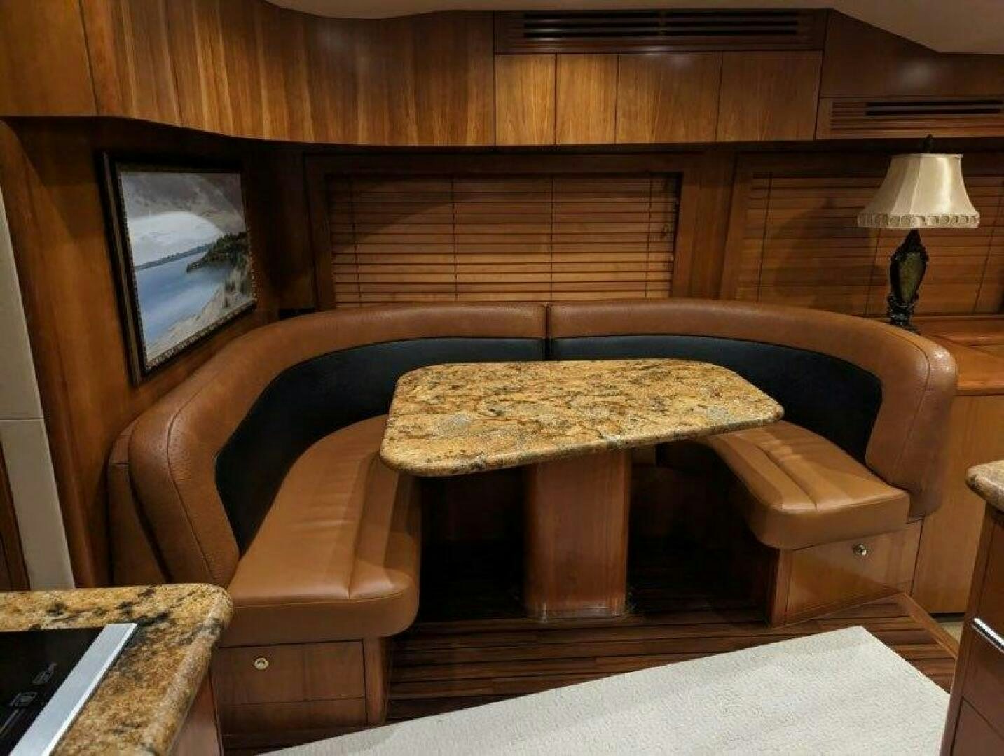 a room with a chair and a table aboard BUZZ Yacht for Sale