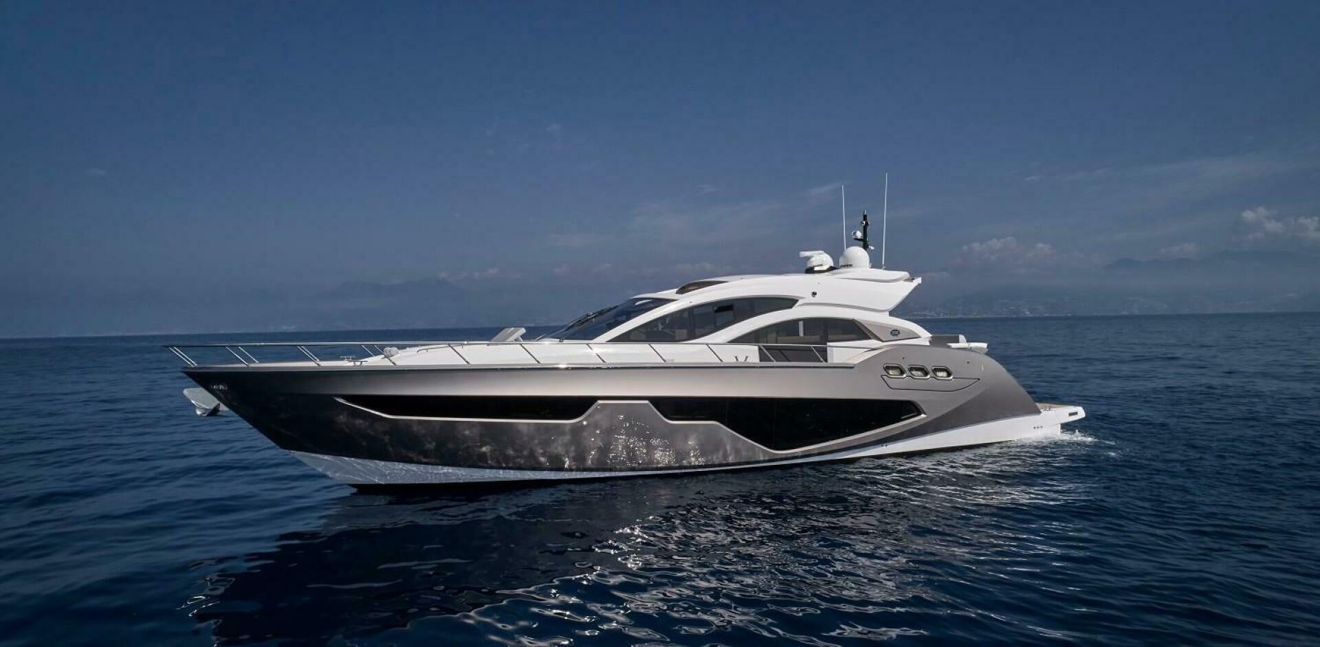 a white yacht in the water aboard C68 Yacht for Sale